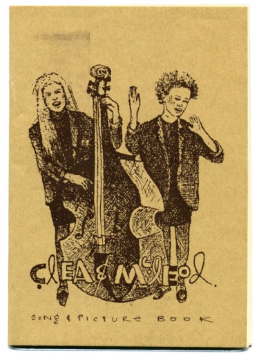 This songbook cover features a hand-drawn picture of the two women singing and playing double bass or clapping. Their names are written across the bottom and 'songs and drawings'.