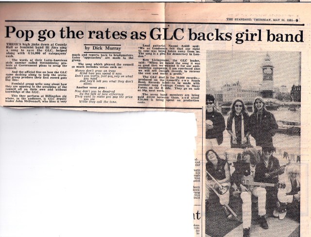 Headlined 'Pop go the rates as GLC backs girl band,' the right-wing daily London paper reports on how the band Hi Jinx has produced a record called 'Streamlining' to protest the Tory government's abolition of the Greater London Council. 'We felt as Londoners our right to vote was being taken away. The song is a plea for democracy.' The article is illustrated with a photo of the band with their instruments on the South Bank, the Thames and Houses of Parliament in the background.