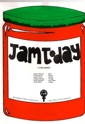Front cover of lyrics booklet, Jam Today logo of red jam jar, label listing line-up names including Jo Richler, and a women's liberation clenched fist symbol.
