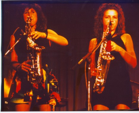 Meet Your Feet's two saxophone players on stage in full swing.