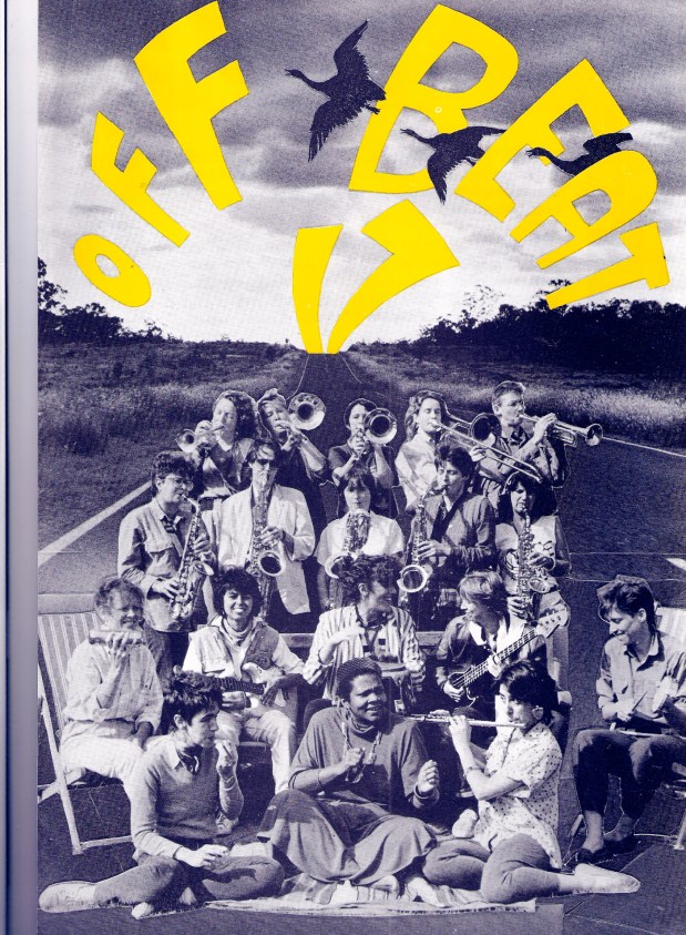 Offbeat 17 poster Poster using yellow bubble letters saying 'Offbeat 17' on a blue and white photo of band posing in a road which leads off into the distance behind them, playing and/or smiling, with their instruments. Women playing brass instruments standing in back rows, guitars and percussion in front.