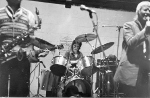 Saxophonist, drummer, singer playing .